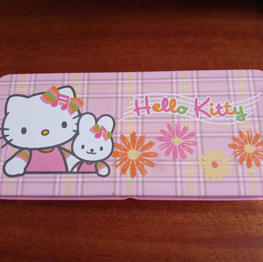 Sanrio Hello Kitty pencil case, hair chopsticks, & Sailor Moon cards package